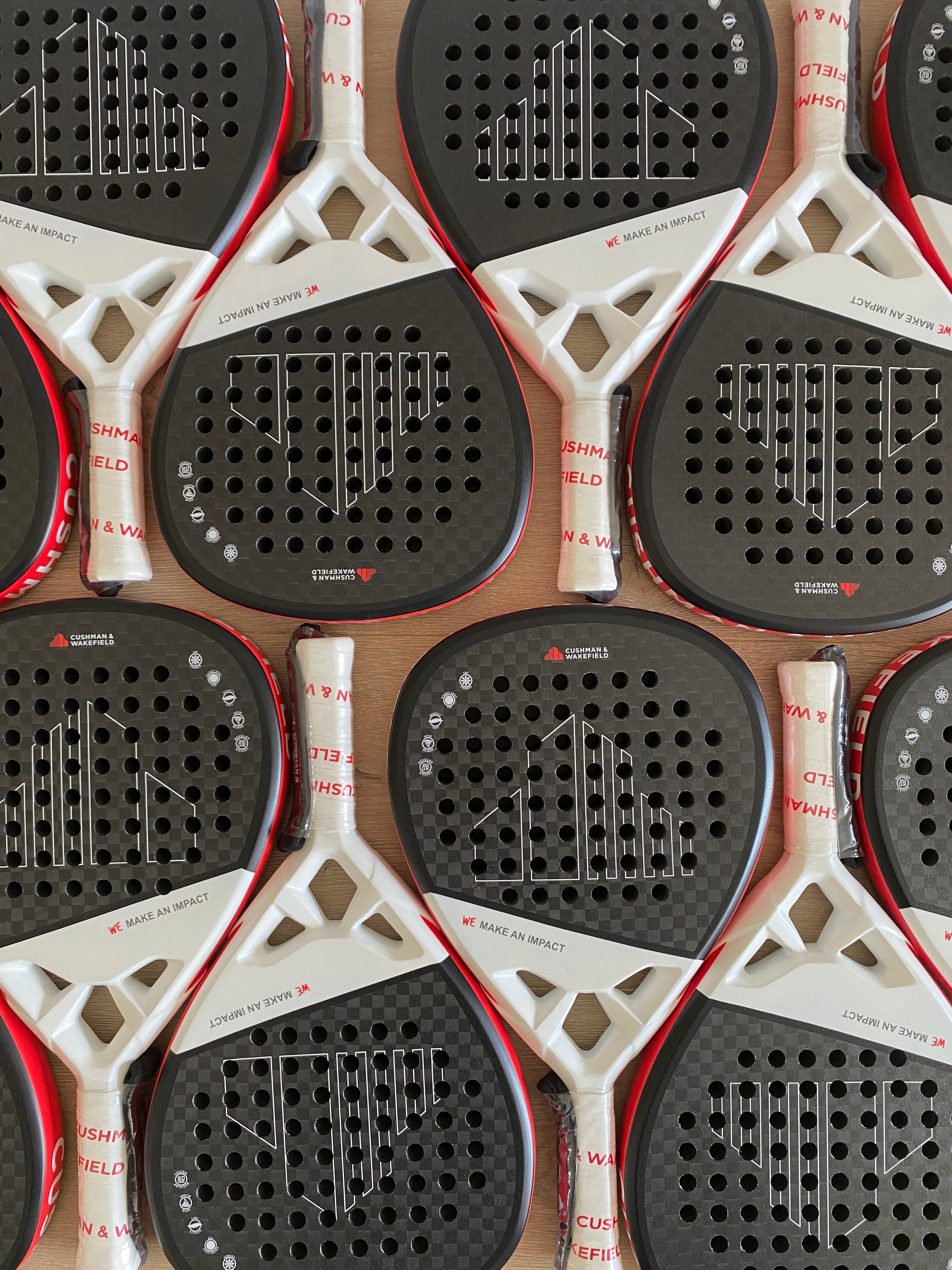 Padelrackets met logo voor Cushman and Wakefield!